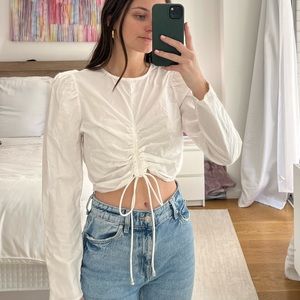 White‎ long sleeve cropped shirt. Scrunched middle. Adjustable. Size small